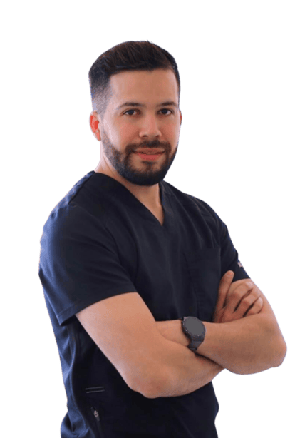 Dr. David Martinez smiling at EnamelDent, a modern dental clinic in Tijuana, Mexico